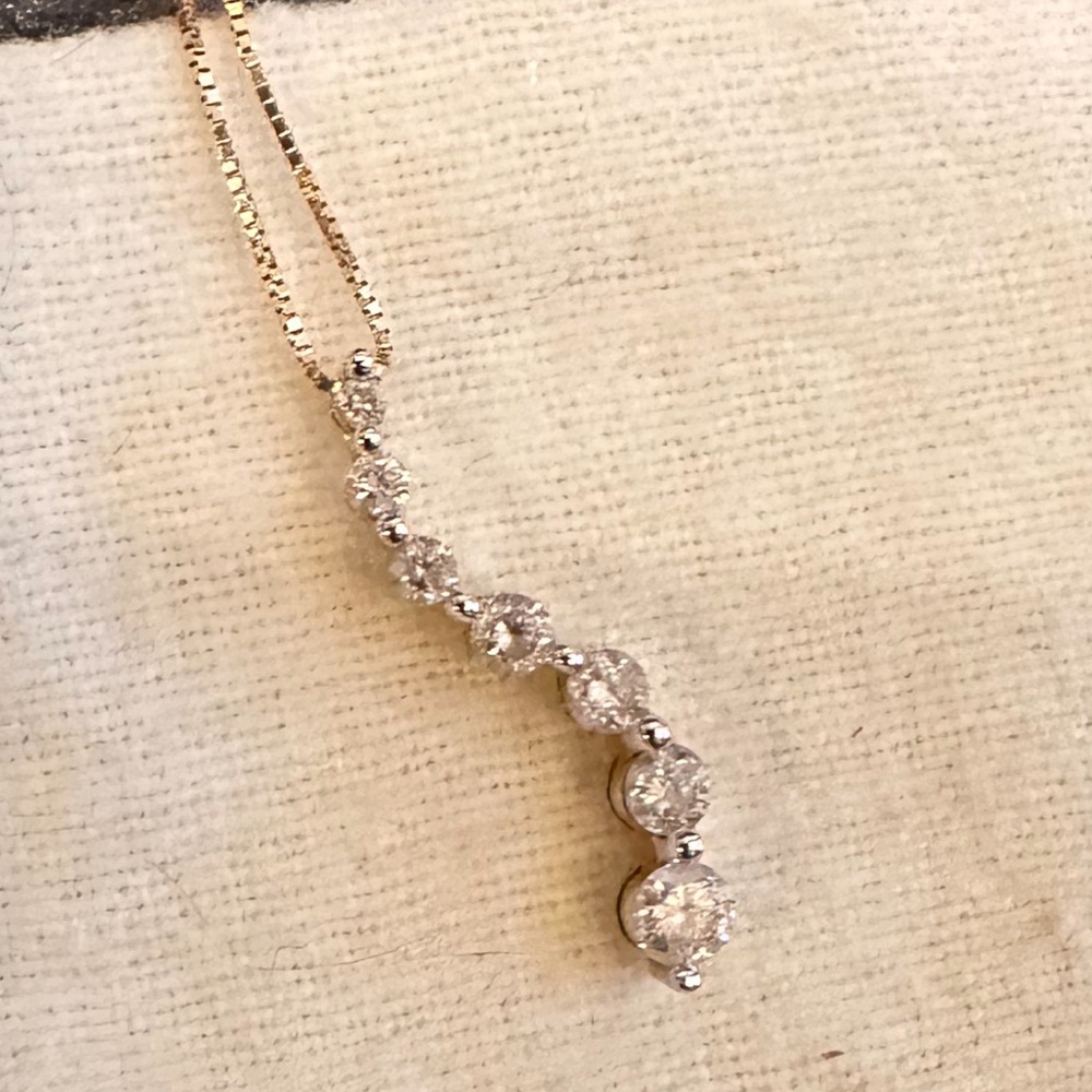 14k 7 Diamond Journey Necklace with 14k 18” box gold chain.